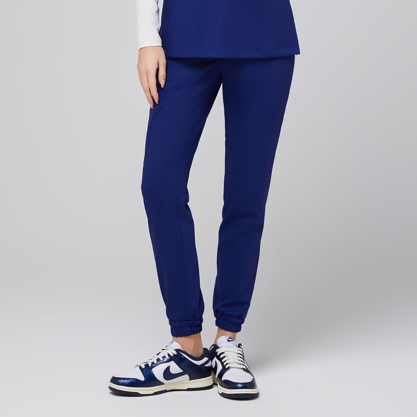 Close-up of Admiral Blue StretchFit Jogger Scrub Pants, showing the elastic ankle cuff,Admiral Blue