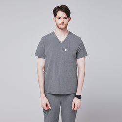 Image of A man wearing an Ash Gray Single Pocket Scrub Top, part of a matching scrub set,Ash Gray