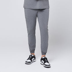 Image of Close-up of Ash Gray StretchFit Jogger Scrub Pants, showing the elastic ankle cuff and a side pocket,Ash Gray