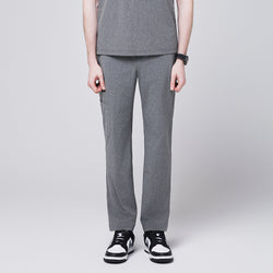 Image of Ash gray straight-leg scrub pants with a side pocket, paired with a matching gray top and black-and-white sneakers,Ash Gray