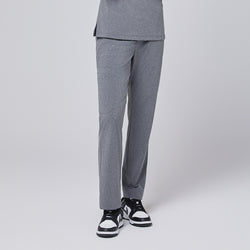 Image of Ash gray straight-leg scrub pants with a split hem, featuring a cargo pocket, paired with black-and-white sneakers on a neutral background,Ash Gray