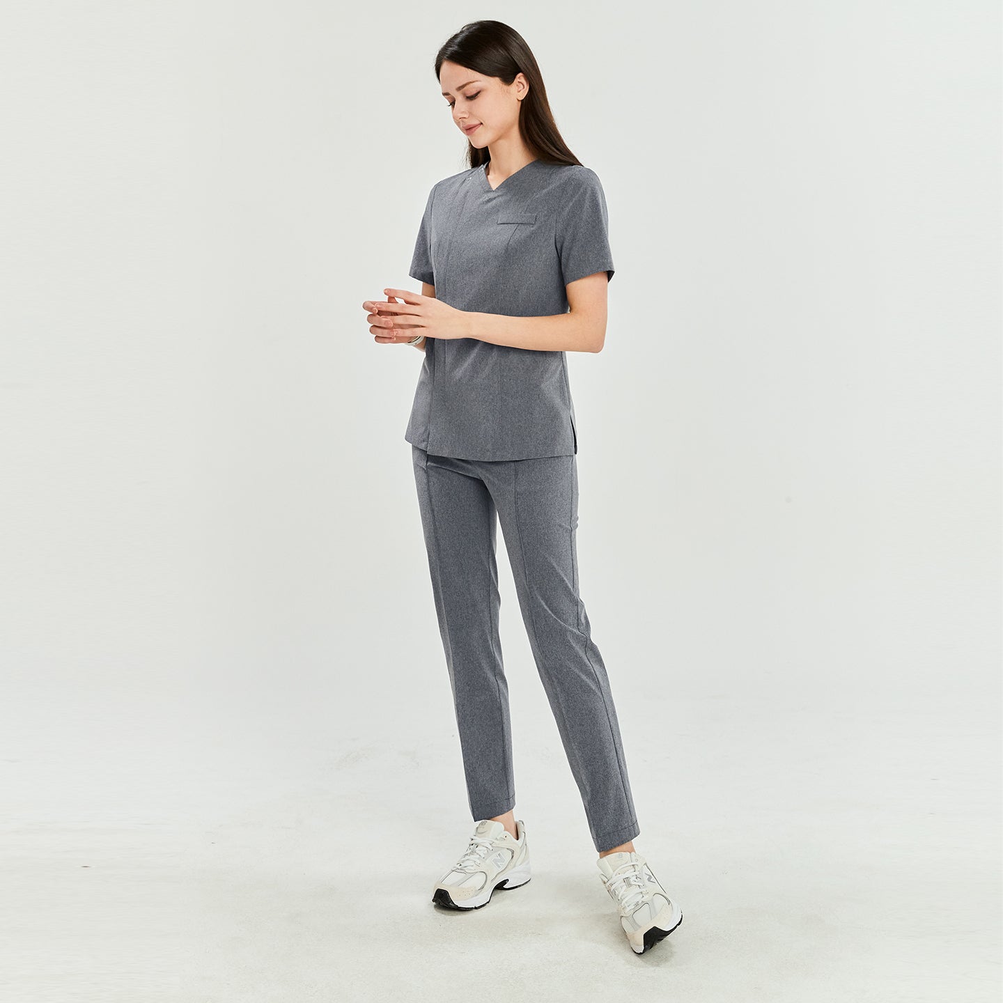 Ash gray scrub set with straight-leg pants, paired with white sneakers, shown in a standing pose,Ash Gray