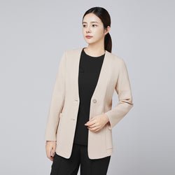 Image of A professional woman wearing a beige comfort cardigan over a sleek black top and trousers, styled with her hair tied back, looking poised against a neutral background,Beige