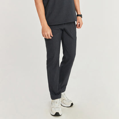 Model wearing zipper straight scrub pants with zipper details and side pockets, paired with a matching scrub top and white sneakers,Charcoal Gray