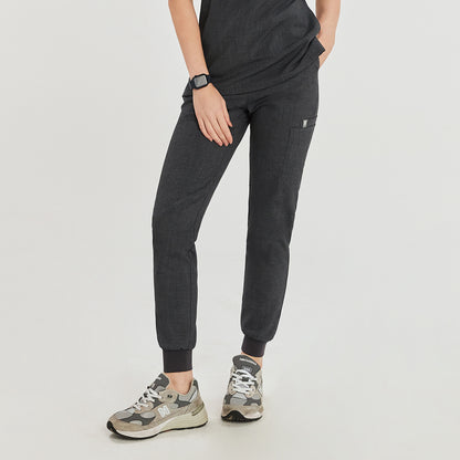 Charcoal gray jogger scrub pants with side pocket, paired with gray sneakers,Charcoal Gray