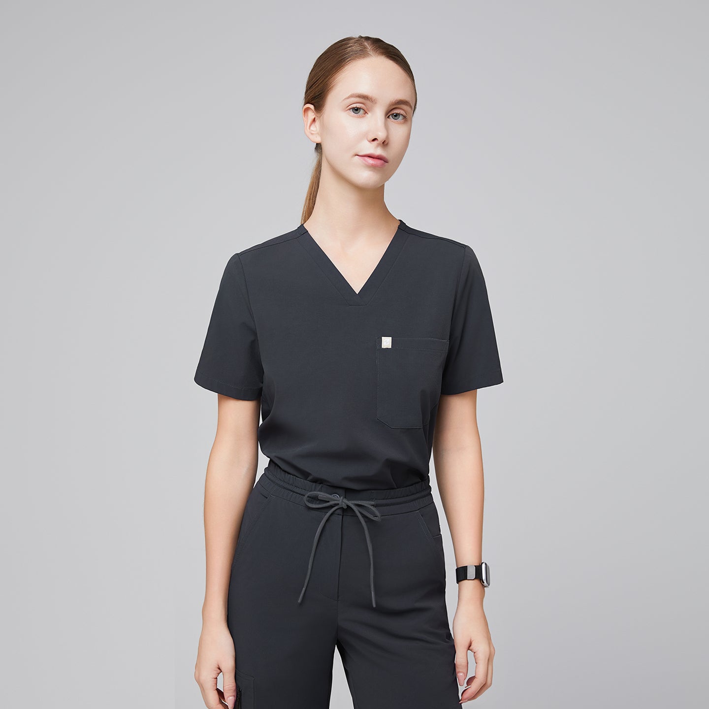 Deep gray single-pocket V-neck scrub top paired with drawstring pants, offering a clean and professional medical uniform style,Deep Gray