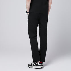 Image of man back view, wearing Zenir eco-black 8-pocket straight scrub pants paired with black-and-white sneakers,Eco Black