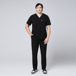 Image of Man wearing a black scrub set with a single-pocket V-neck top, designed for healthcare professionals,Eco Black