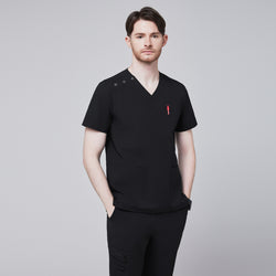 Image of Man wearing Zenir black shoulder button scrub top with chest and lower pockets, featuring a red pen in the chest pocket,Eco Black