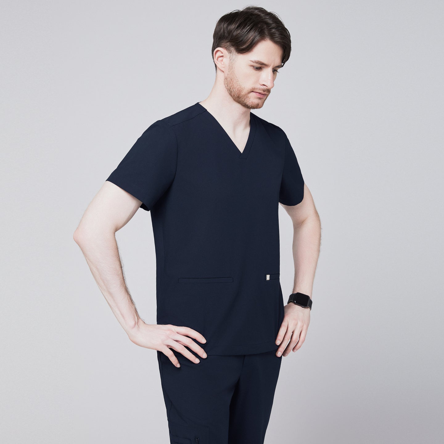 Men's navy blue scrub top with V-neck and double pockets, paired with matching navy pants,Eco Navy