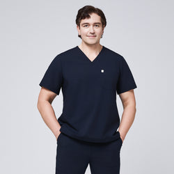 Image of Men's navy scrub top with a single pocket, designed for medical professionals,Eco Navy