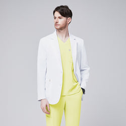 Image of A man wearing a short white lab coat (LCM-01) over a Pineapple Yellow Single Pocket Scrub Top and Pineapple Yellow StretchFit Jogger Scrub Pants, looking to the side,White