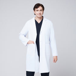 Image of A man wearing a long white lab coat (LCM-02) over an Eco Navy Double Pocket Scrub Top and Eco Navy Zipper Pocket Straight Scrub Pants, placing his hand in the coat pocket,White