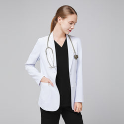 Image of A woman wearing a short white lab coat (LCW-02) over an Eco Black Double Pocket Scrub Top and Eco Black Zipper Pocket Jogger Scrub Pants, placing her hand in the lab coat pocket,White