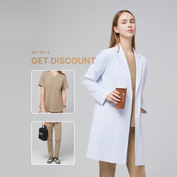 Image of Female model wearing Zenir’s Women’s White Long Lab Coat LCW-10 over a Sand Beige Soft Stretch Scrub Set, holding a coffee cup,White