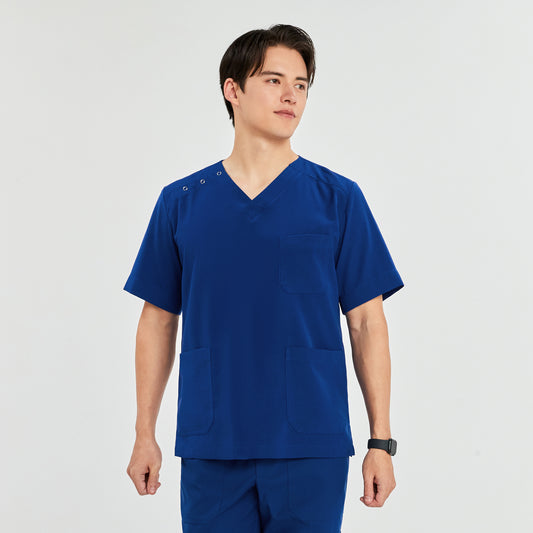 A man wearing a scrub top with a V-neck, three-button detail on the shoulder, and multiple pockets, standing with his hands by his sides,Royal Blue