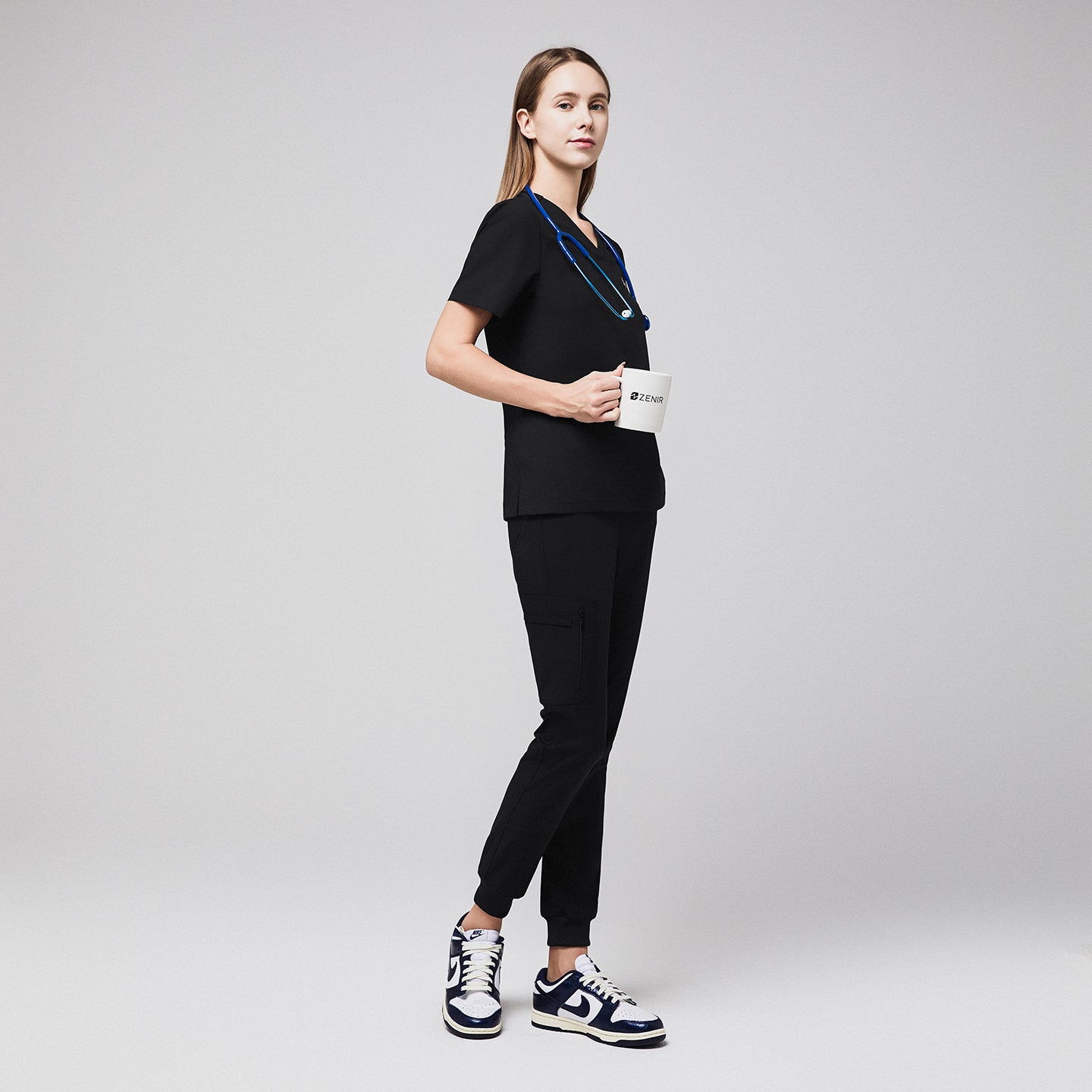 edical professional wearing jogger-style scrub pants with a stethoscope and holding a mug,Midnight Black