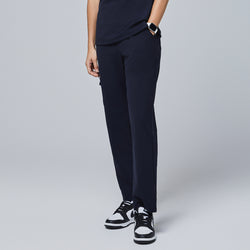 Image of Navy utility scrub pants with a clean design and side pockets, paired with black-and-white sneakers and a smartwatch,Midnight Navy