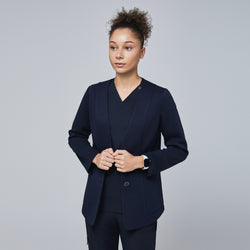 Image of Close-up of a woman wearing a navy comfort cardigan over a matching V-neck scrub top, styled for a polished and professional look,Navy