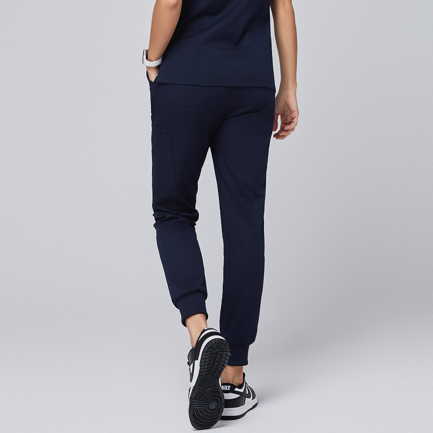 Stylish navy jogger scrub pants showcasing a sleek back design with practical pockets, perfect for modern healthcare professionals,Navy