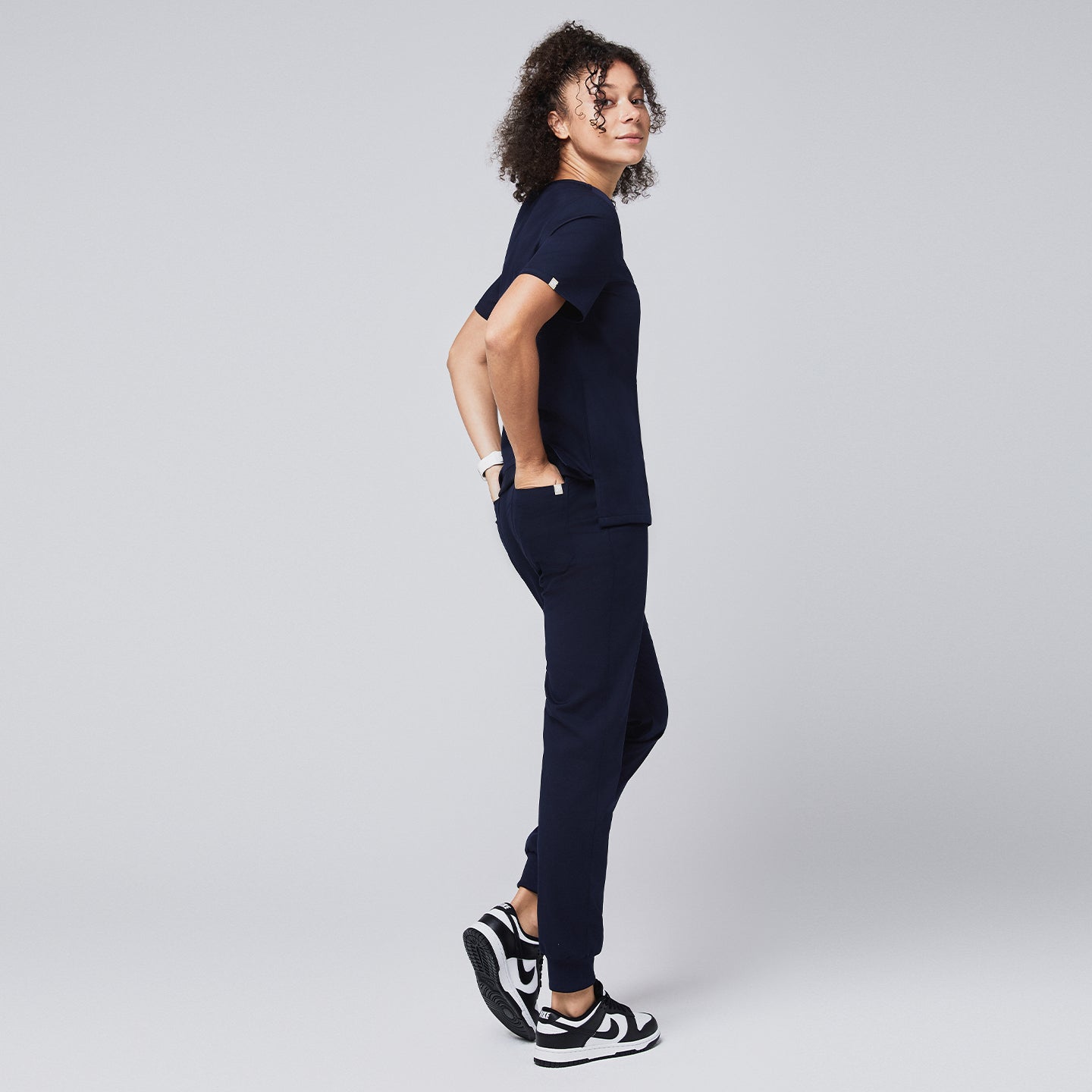 Professional navy scrub joggers styled for comfort and mobility, paired with a sleek matching top, perfect for active work environments,Navy