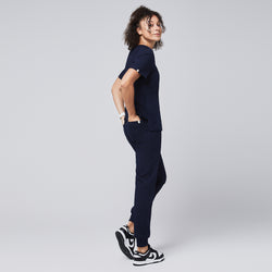 Image of Professional navy scrub joggers styled for comfort and mobility, paired with a sleek matching top, perfect for active work environments,Navy