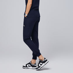 Image of Premium navy jogger scrub pants designed for a comfortable and active workday, featuring functional side pockets and cuffed hems for a tailored fit,Navy