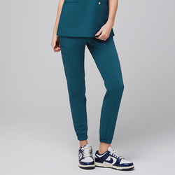 Image of Close-up of Ocean Teal StretchFit Jogger Scrub Pants, showing an elastic ankle cuff and a side pocket,Ocean Teal