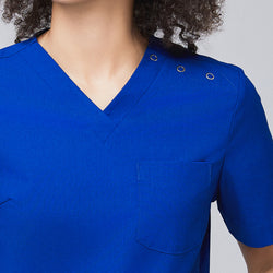 Image of Close-up of a royal blue scrub top showing a V-neck design, shoulder button details, and a chest pocket,Royal Blue