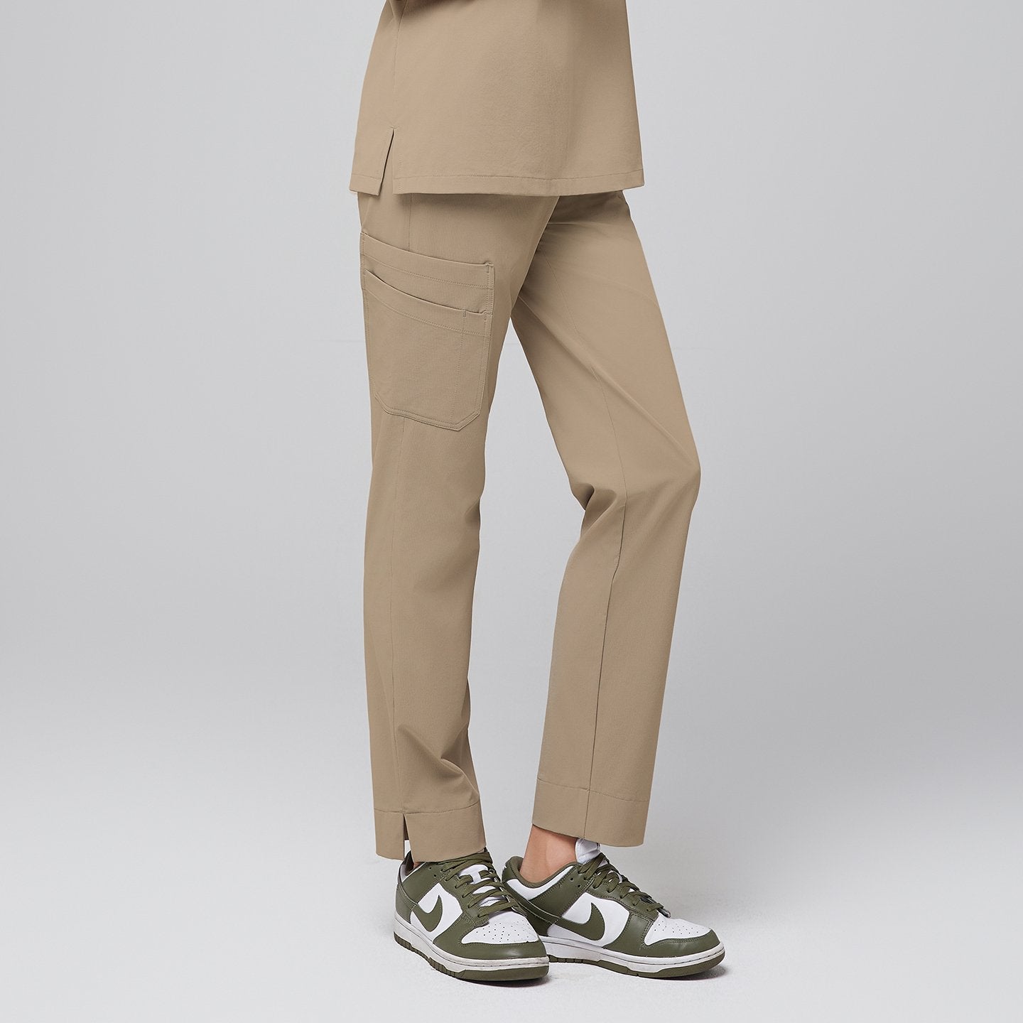 Close-up of Sand Beige Straight Split Hem Scrub Pants with a large side pocket,Sand Beige