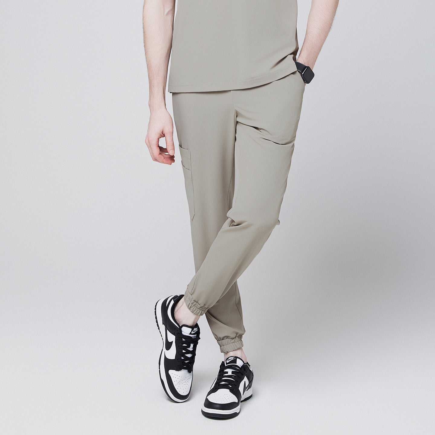 Close-up of Sand Khaki StretchFit Jogger Scrub Pants, showing the zippered side pocket and elastic ankle cuff,Sand Khaki