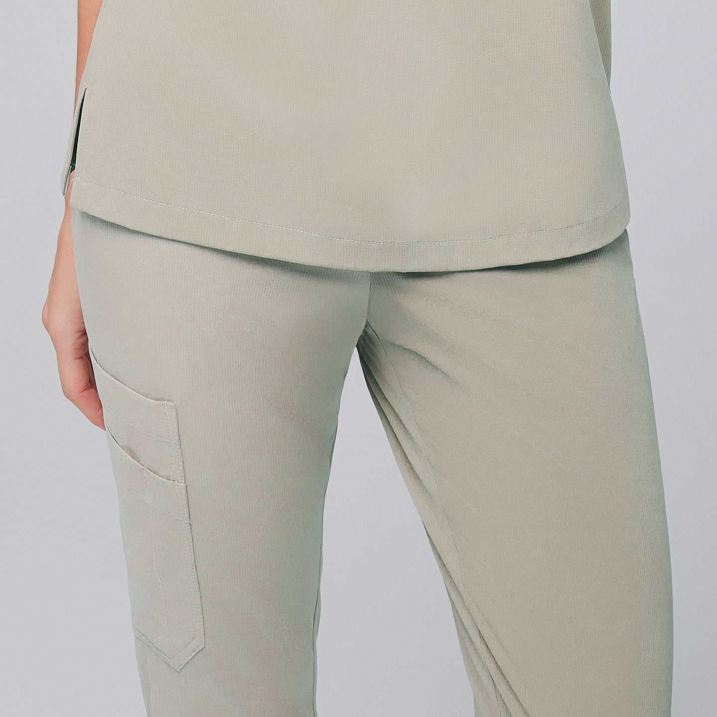 Close-up of sand khaki jogger scrubs showing pocket detail, Sand Khaki