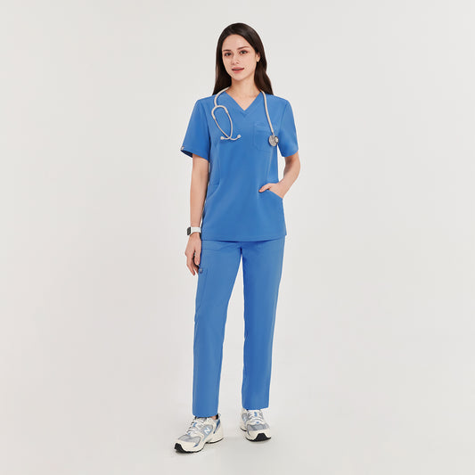  Woman in sky blue zipper slit scrub pants and matching top, standing with a stethoscope around her neck, showcasing the full outfit,Sky Blue