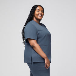 Image of Plus-size healthcare professional in smoky blue scrub top with side view and double pockets,Smoky Blue