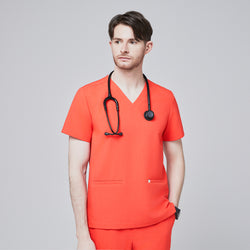 Image of Man wearing tiger orange scrubs with a V-neck and double pockets, accessorized with a black stethoscope,Tiger Orange