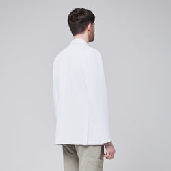 Image of Back view of a male model wearing a white short lab coat over olive green scrub pants, showcasing clean and tailored design,White