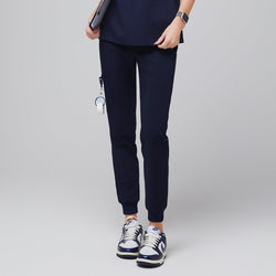 Image of Close-up of Eco Navy Zipper Pocket Jogger Scrub Pants, showing the elastic ankle cuff and side zipper pocket,Eco Navy






